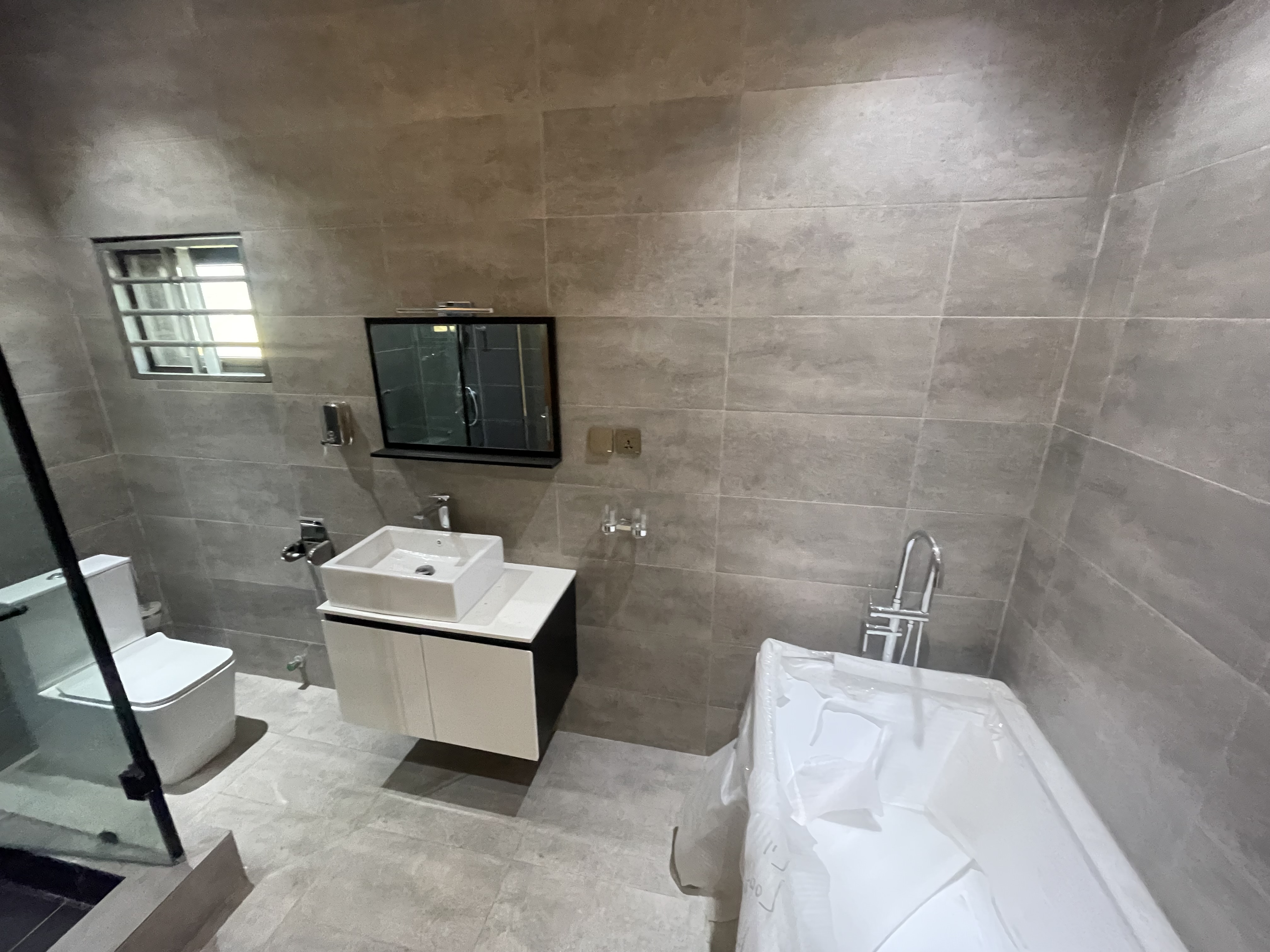 Modern Elegance: 4-Bedroom Home with BQ