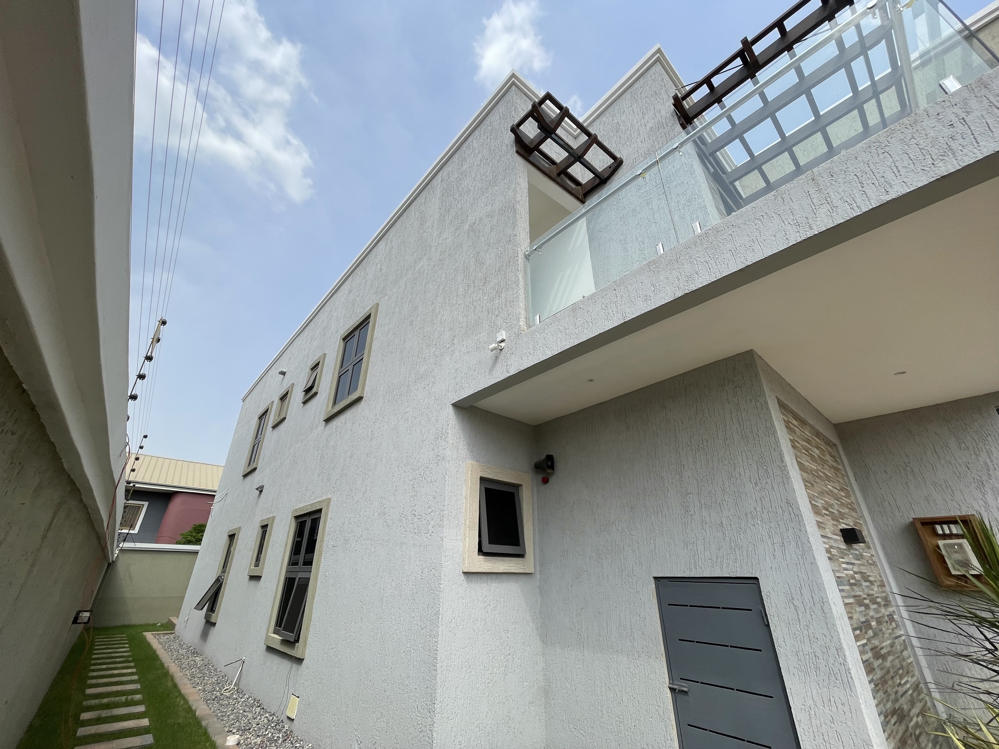 Modern Elegance: 4-Bedroom Home with BQ